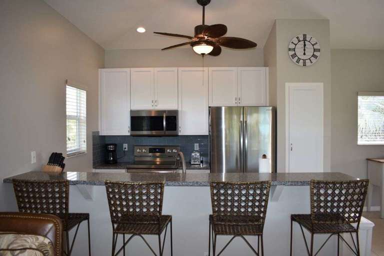 Newly remodeled kitchen with breakfast bar that seats 4 people
