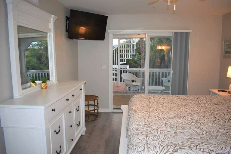 Master bedroom has a flat screen Smart TV with Roku and a private lanai