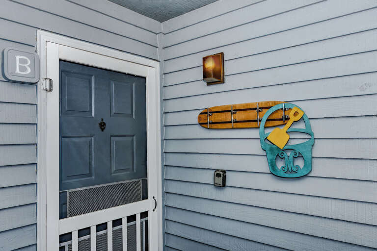 Blue Door Beside Boating Decor On Building