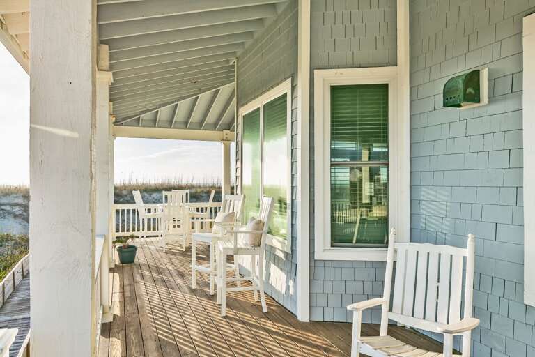Seaside Balcony Breezes Brushing Through Beachfront Vacation Rental
