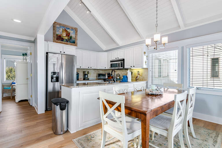 Bright Beachside Vacation Rental Kitchen And Dining Area