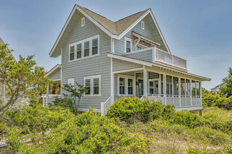 Seaside Structure Surrounded By Greenery