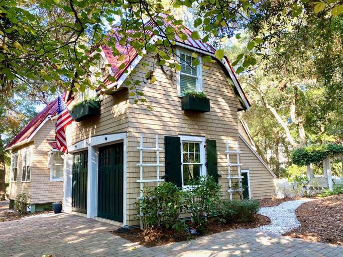 Shady, Shuttered Structure Surrounded By Serene Scenery