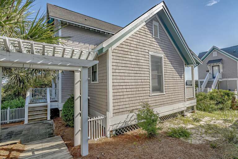 Beachside Bungalow Bordered By Balmy Breeze