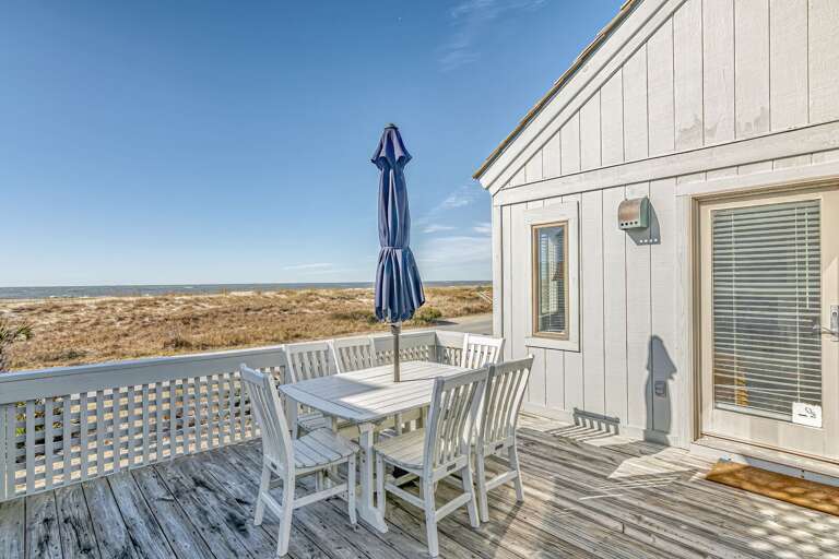 Seaside Deck Dining, Sunny Skies, Sandy Dunes View