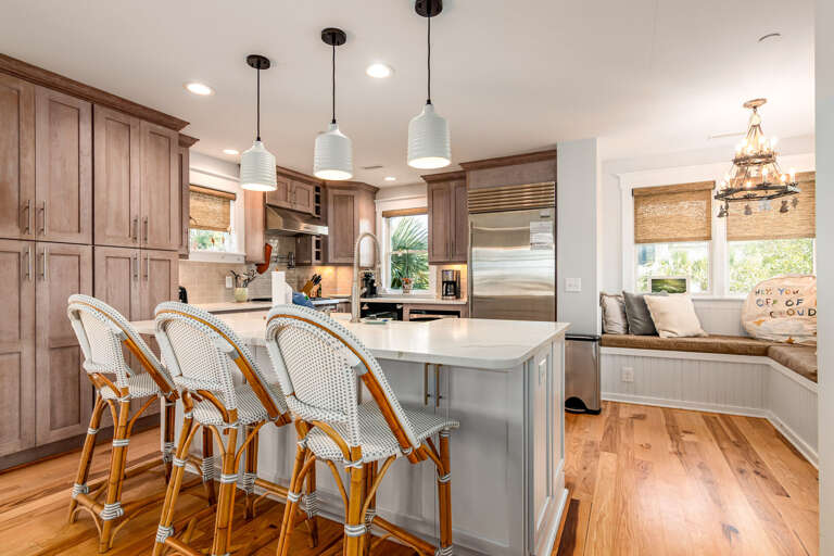 Spacious Kitchen Leading To Luminous Living Area In Vacation Rental
