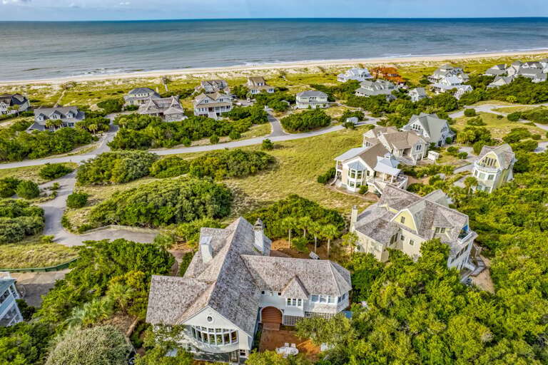 Seaside Sprawl, Homes Humbly Huddled By Beach-blessed Landscape