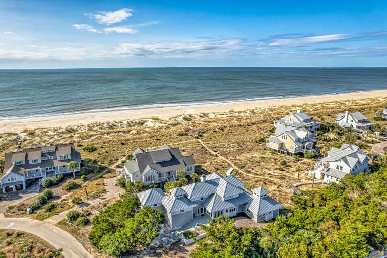 Beachside Houses Beside Boundless Blue Sea Beachside Houses Beside Boundless Blue Sea