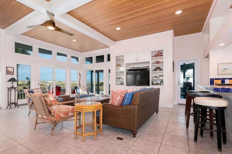 Bright, Breezy Room With Ceiling Fan, Large Windows, And A View Of The Landscape Bright, Breezy Room With Ceiling Fan, Large Windows, And A View Of The Landscape
