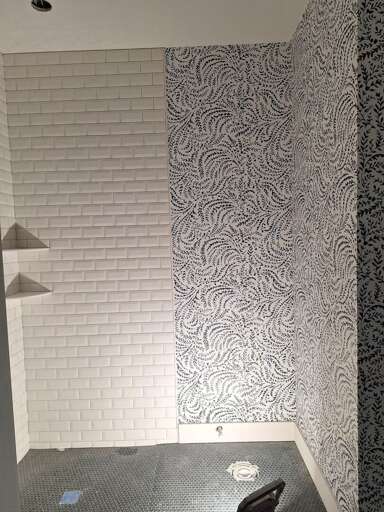 Patterned Wall And Tiled Floor In A Small Space