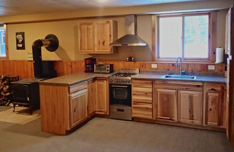 The additional kitchen is great for large groups, or for the early birds looking to make some scrambled eggs in the morning without going upstairs