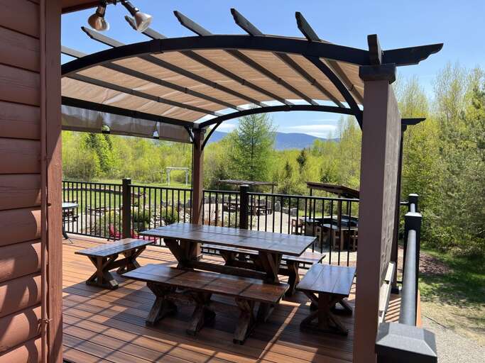 On deck dining table with awning