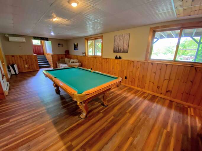 When it comes to entertainment spaces, there is no lack of it at Moose Lodge! Aside from the living room, reading area, there are a separate TV room, pool table area, and foosball area.