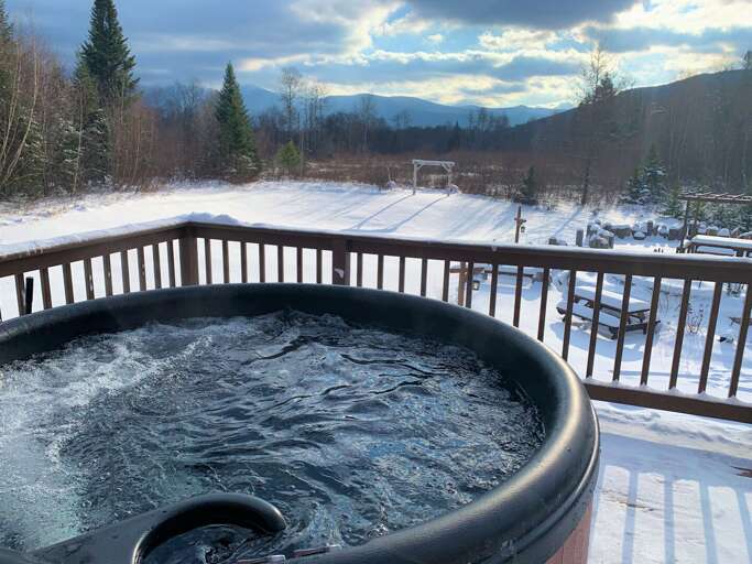Welcome to Moose Lodge! Come for the view, stay for the amenities! From hot tub to outdoor kitchen to beach and walking trails, there is nothing else like it in Bretton Woods!