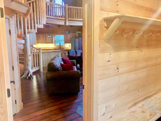 The convenient mudroom leads you inside