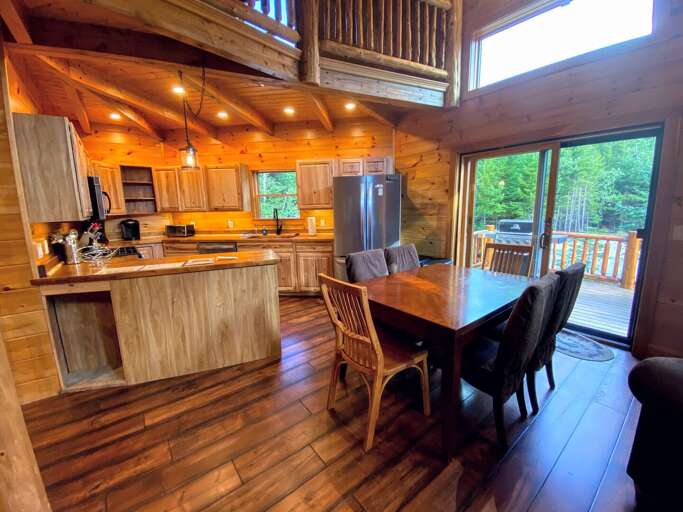 Kitchen and dining area Kitchen and dining area