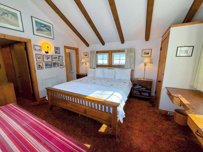 Bedroom #1: Located on the main level and features a King bed and ensuite full bath. Sleeps 2.