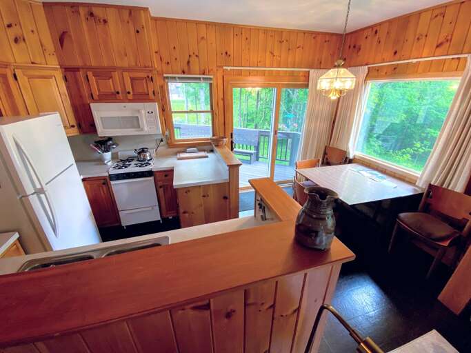 Fully stocked kitchen for all your cooking needs and offers a coffee maker and cozy dining table that seats 4.