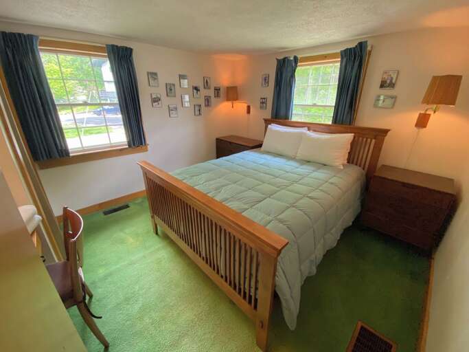 Guest Bedroom #2: Located on the main level and features a Queen bed. Sleeps 2. New mattress as of March 2022.