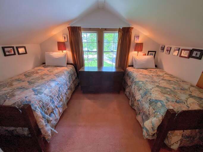 Guest bedroom #4: Located on the upper level and features 2 Twin beds. Sleeps 2. New mattress as of March 2022.