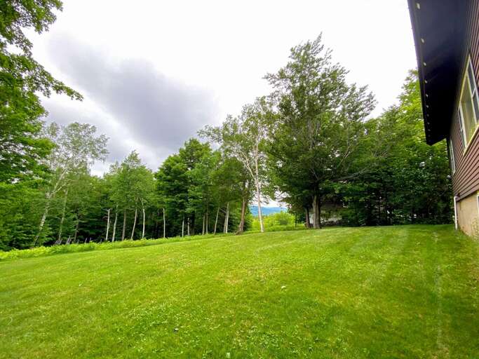 Large lawns and patio with Mittersill/Cannon views.