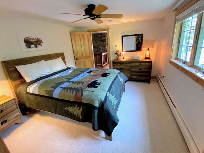 First guest bedroom is located on the second floor and features a Queen bed. Sleeps 2. First guest bedroom is located on the second floor and features a Queen bed. Sleeps 2.