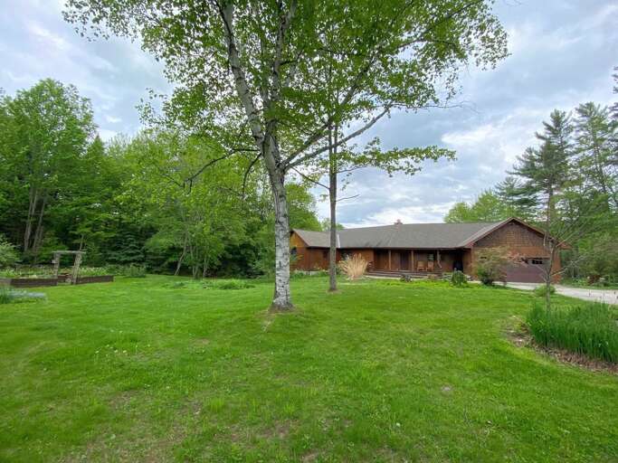 Rural House Surrounded By Greenery