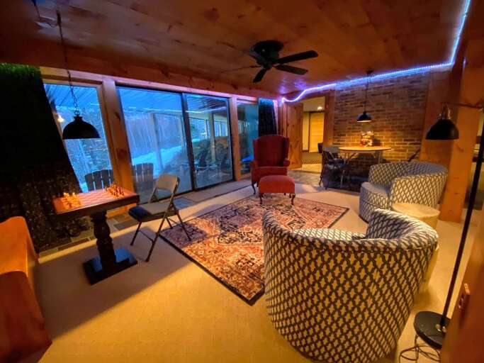 Lower level game room and walkout with foosball table