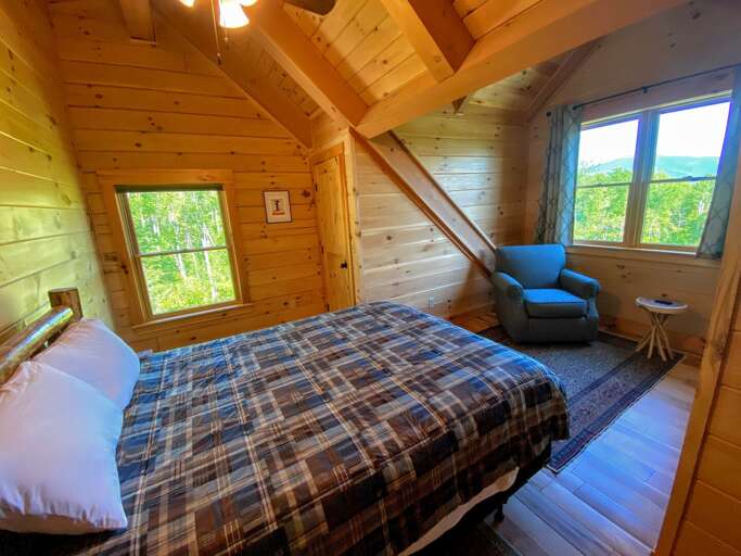 Guest Bedroom #1 is located on the second floor and features a Queen bed. Sleeps 2.