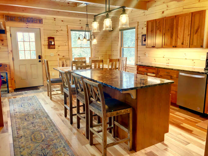 Views of the mountains from the large doors leading to the back deck for additional outdoor dining.