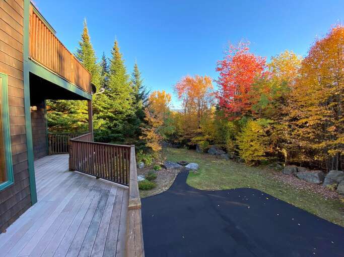 Looking out from 1st level deck outside bedrooms and living area to the lower parking area with direct access to the lower apartment.