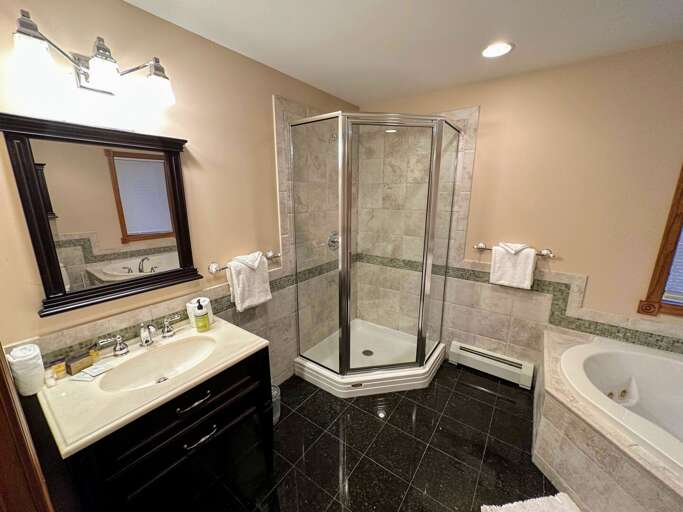 Bedroom 1 Ensuite Bath with shower and soaking tub