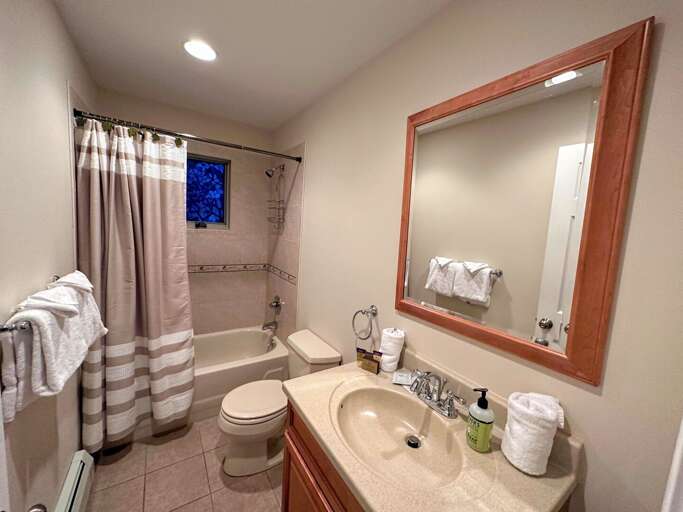 Shared bathroom between bedrooms 2 and 3 on level 1