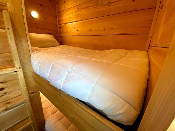 While not technically a 2 bedroom, the Campside offers a separate room with two built in bunks for extra sleeping.