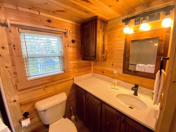 This bathroom is just in front of the washer and dryer, and before the master's bedroom.