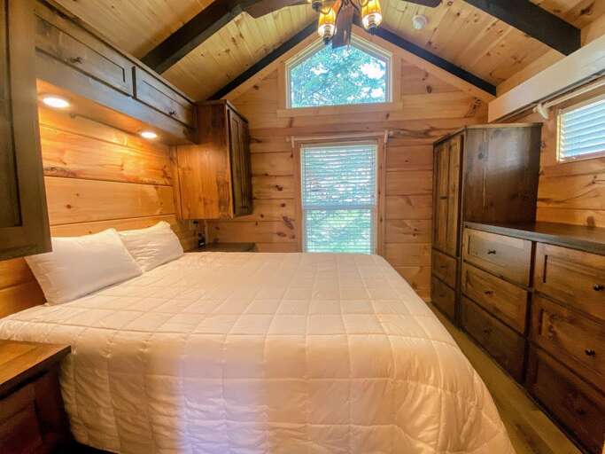 The master bedroom offers a queen bed and full privacy. The master bedroom offers a queen bed and full privacy.