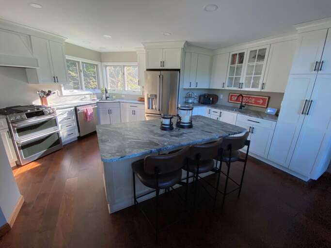 Renovated kitchen with breakfast bar for 3