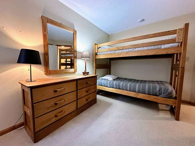 Lower Level Bunk Bedroom with two twin-over-twin bunk beds Lower Level Bunk Bedroom with two twin-over-twin bunk beds