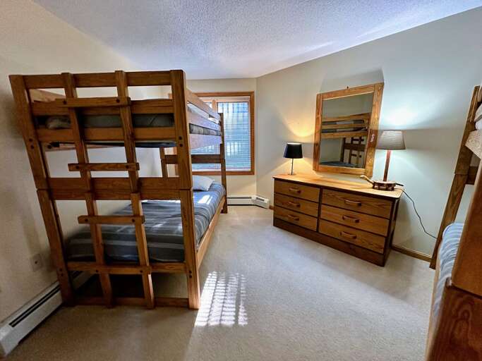 Lower Level Bunk Bedroom with two twin-over-twin bunk beds