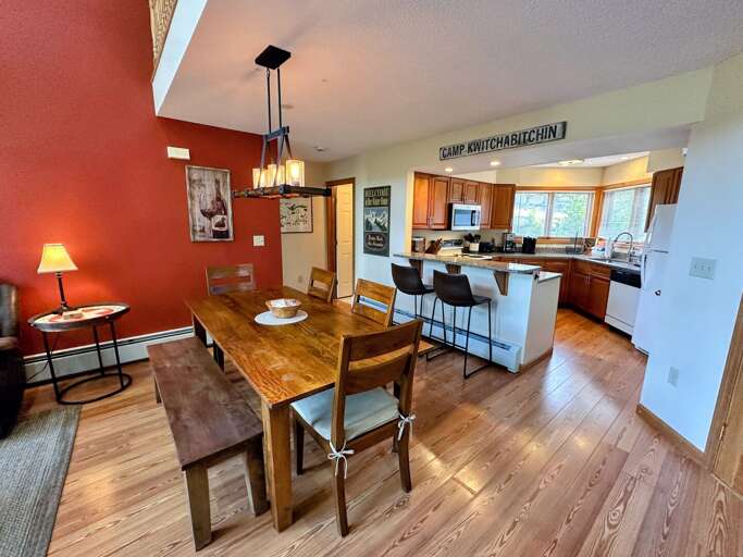 Main level dining area and breakfast bar Main level dining area and breakfast bar