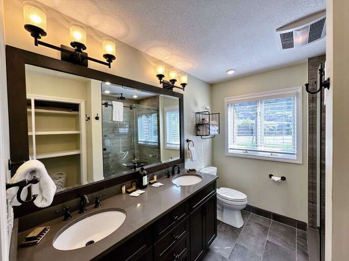 Main level King bedroom private bath with shower Main level King bedroom private bath with shower