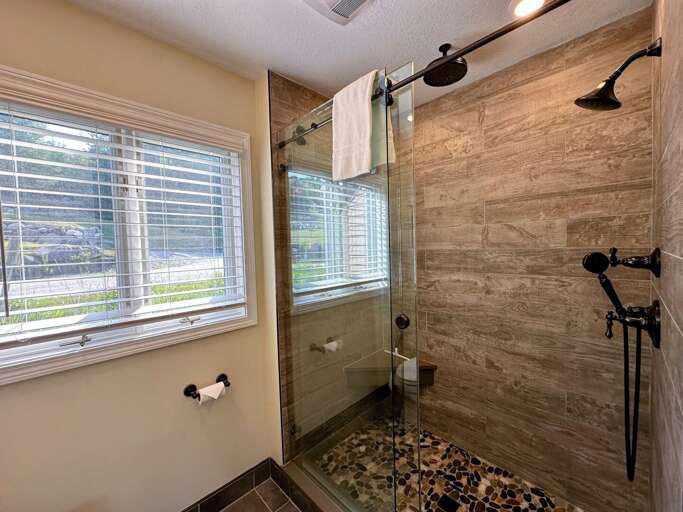 Main level King bedroom private bath with shower Main level King bedroom private bath with shower