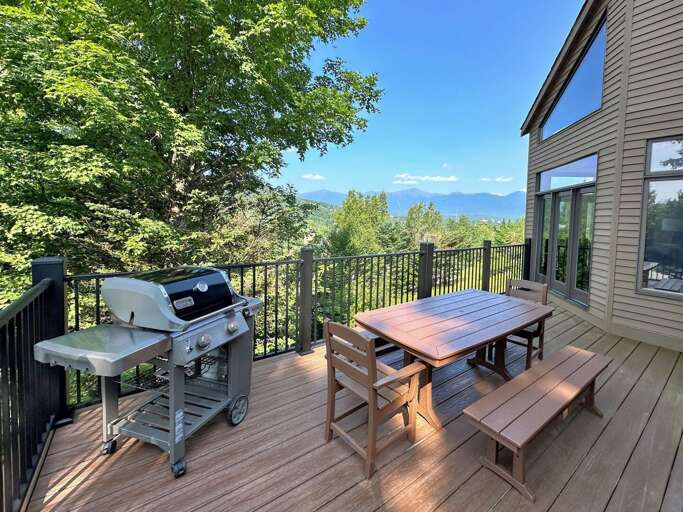 A newly expanded front deck allows for a lovely dining and grilling area A newly expanded front deck allows for a lovely dining and grilling area