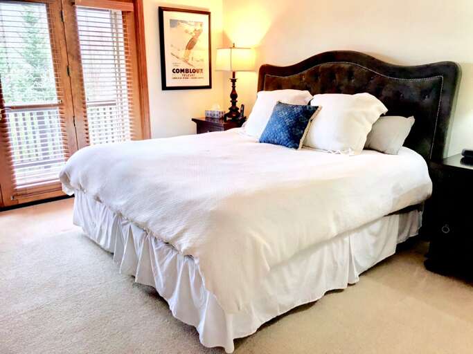 Located on the main level and features a King size bed and private bath. Access to the back deck. Sleeps 2.