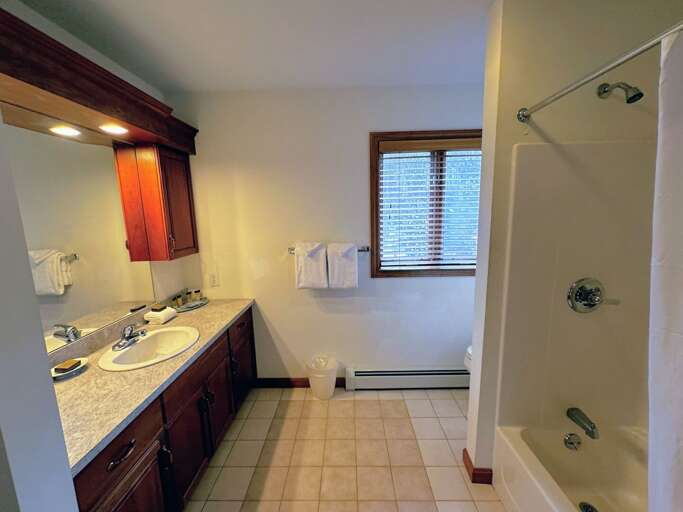 Upstairs Shared Bathroom with Shower/Tub Combo Upstairs Shared Bathroom with Shower/Tub Combo