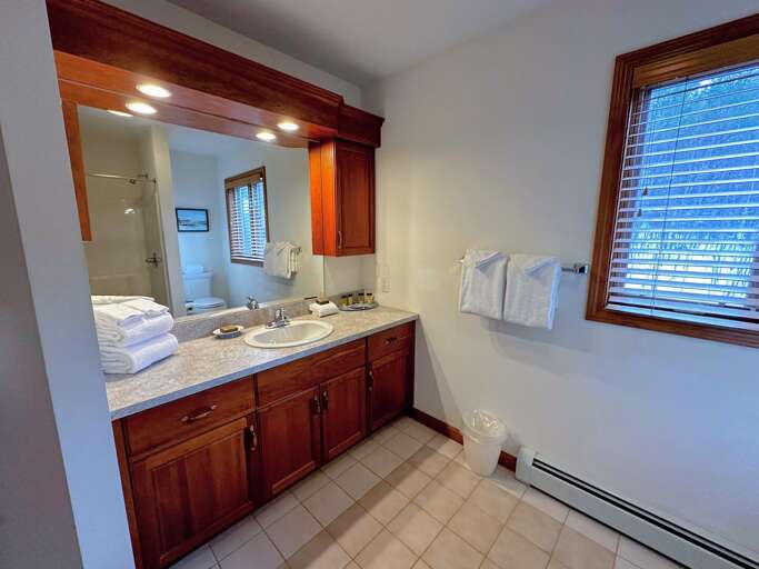 Upstairs Shared Bathroom with Shower/Tub Combo Upstairs Shared Bathroom with Shower/Tub Combo