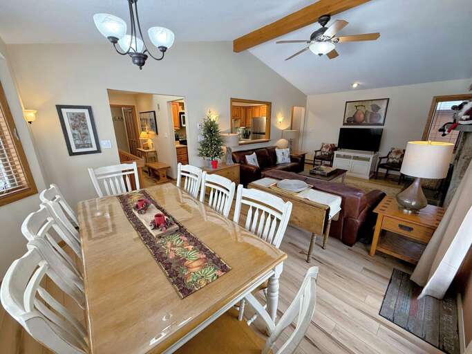 Dining/Living Area: Open concept space offers dining table with room for 8 and comfortable couches to relax by the stone fireplace. TV with high speed wi-fi included.