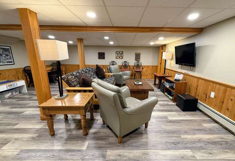 The extra living/game room on the lower level is just a added bonus among all that this "cozy cottage" has to offer.