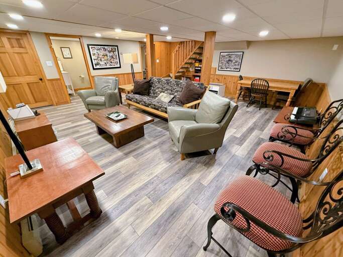 The extra living/game room on the lower level is just a added bonus among all that this "cozy cottage" has to offer.