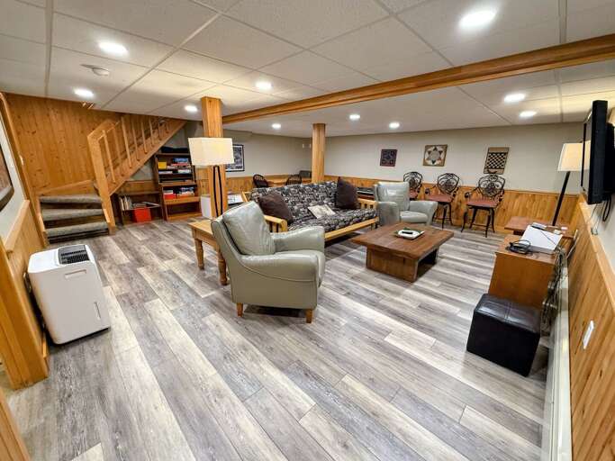 The extra living/game room on the lower level is just a added bonus among all that this "cozy cottage" has to offer.